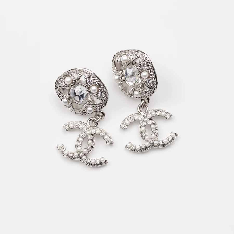 2009 CHANEL Silver Toned Black Enameled Camellia Pierced Earrings For Sale  at 1stDibs  chanel black flower earrings chanel earring 13 cm chanel  earrings black and silver